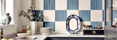 Blue and white ornate oval fired earth kitchen tiles platter with intricate floral patterns