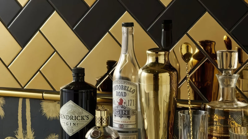 A sleek metallic gold cocktail shaker with polished finish and sturdy base from the gold kitchen tiles collection