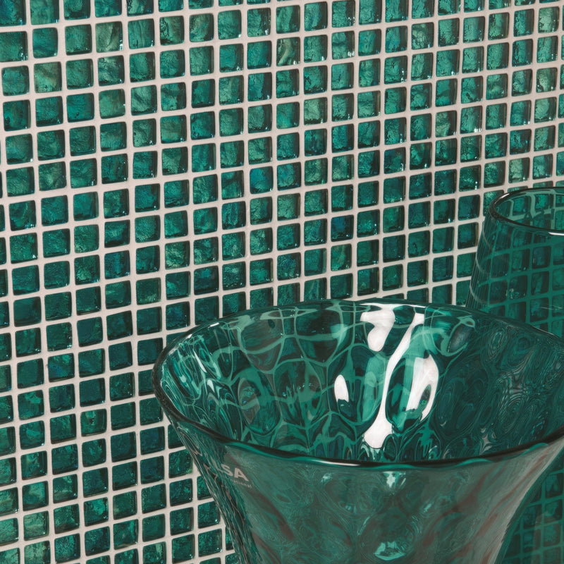 Emerald green textured glass bowl with fluted rim and subtle internal swirls from the Green Tiles collection