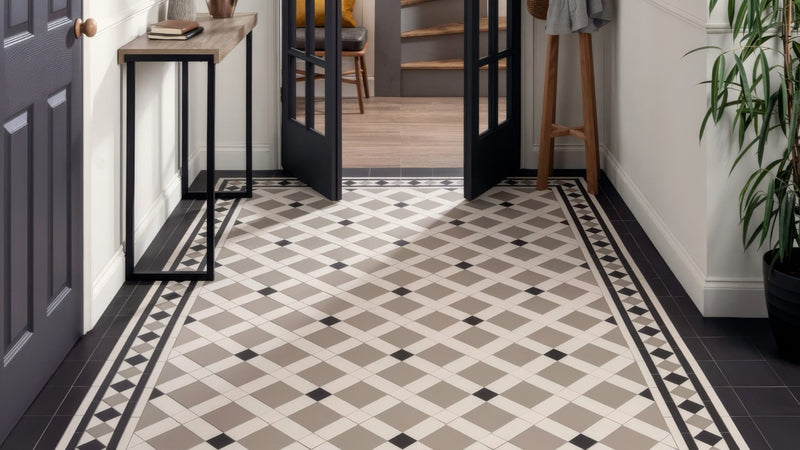 Beige and black diamond patterned mosaic tile floor with decorative border in hallway floor tiles collection
