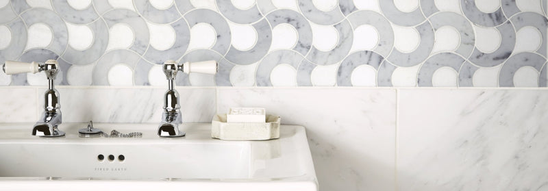 Chrome finished faucet with white ceramic handles from high society marble collection for elegant bathroom use
