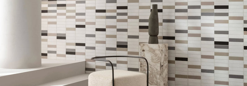 Modern minimalist ceramic tile wall with geometric horizontal stripes in gray white and beige from kelly hoppen perfect neutrals