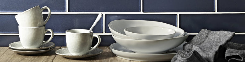 White ceramic dinnerware set with matte finish and subtle texture from kingfisher glass tiles collection