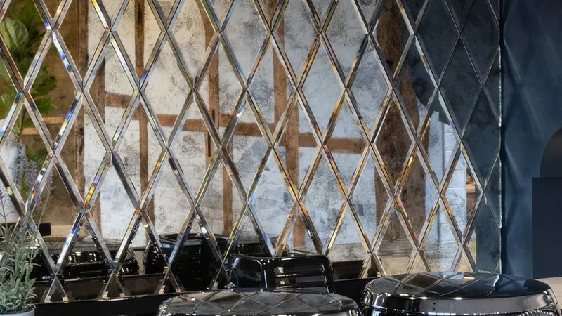 Shiny chrome diamond-patterned mirrored wall panel ideal for kitchen splashback decor and protection