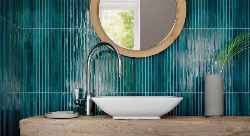 White ceramic vessel sink with curved sleek faucet and polished chrome finish from koeda xl mosaic collection