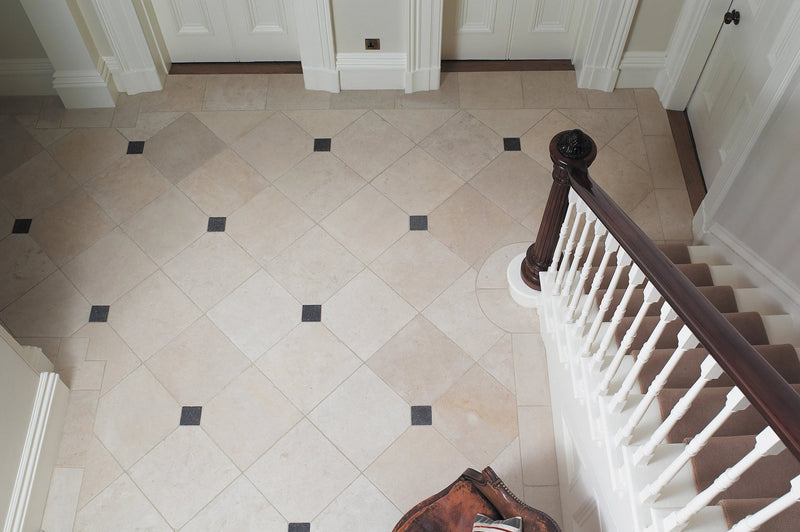 Beige and black diamond-patterned polished marble floor tiles from the limestone tiles collection
