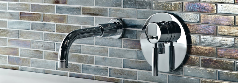 Modern chrome-finished wall-mounted faucet with sleek curved spout and circular knob from malacassa glass mosaic collection
