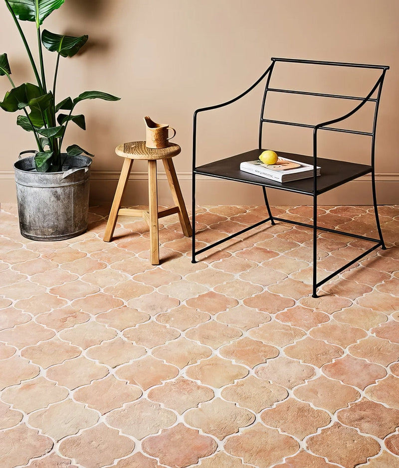 Black metal chair with sleek modern design and flat seat from marlborough terracotta collection