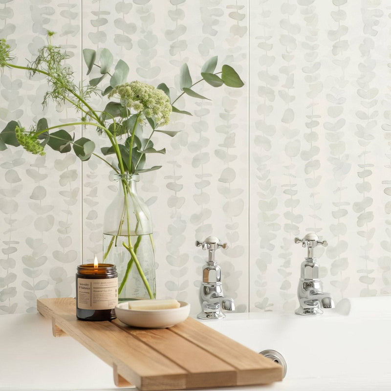 A light wood bath tray with natural finish and slatted design featuring smooth edges from the Meadow collection