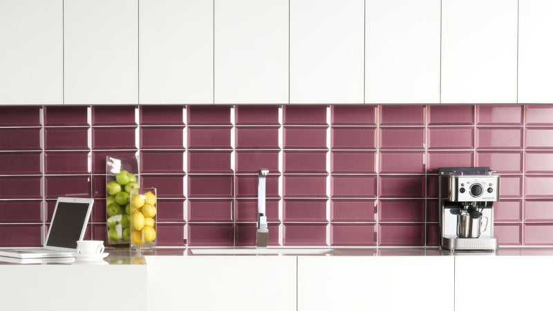A modern kitchen backsplash made of glossy deep burgundy rectangular tiles from Metro Kitchen Tiles collection.