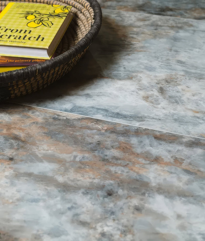 Marbled gray and beige countertop tile with subtle veining from the MINÉRALE Click Tile collection.