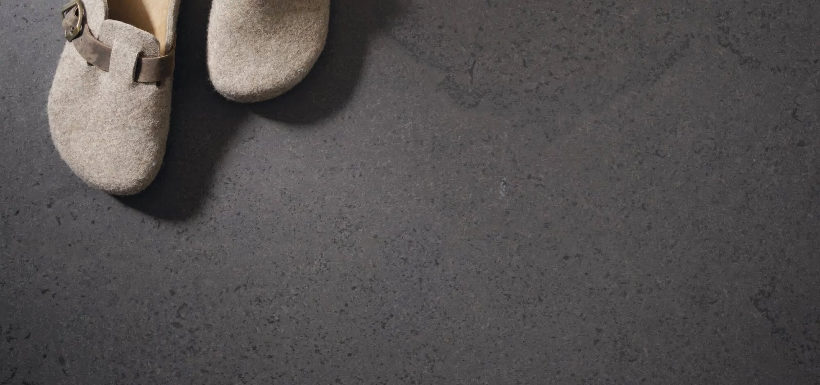 Beige felt clog-style shoes with metallic buckle from the monte coto tiles collection
