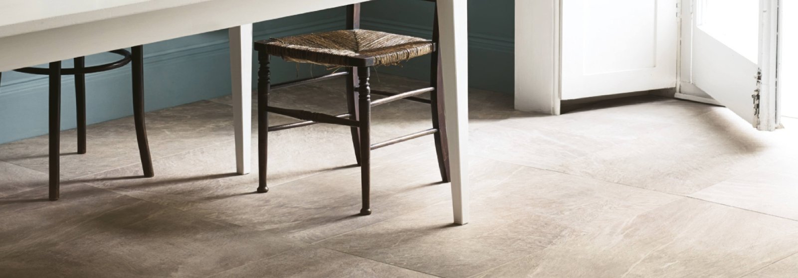 Beige stone-effect floor tile with subtle veining and a matte finish from the odyssey collection