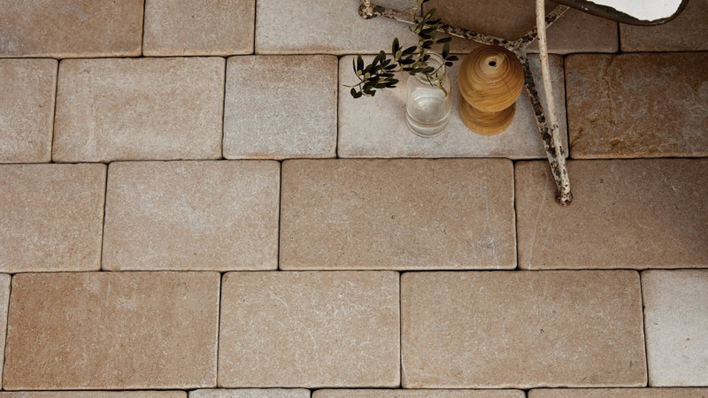Beige rectangular stone pavers with a natural slightly textured surface for outdoor floor tiles