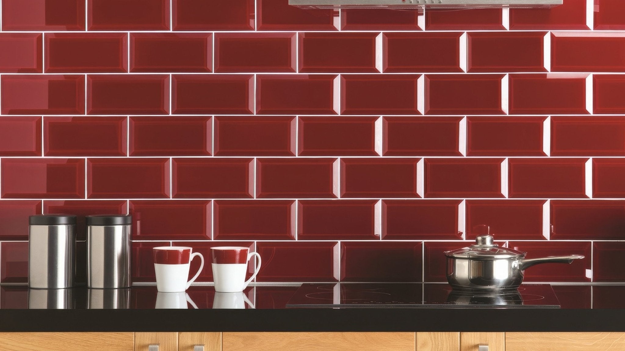 Red glossy subway tile backsplash showcasing vibrant red wall tiles for kitchen or bathroom decor