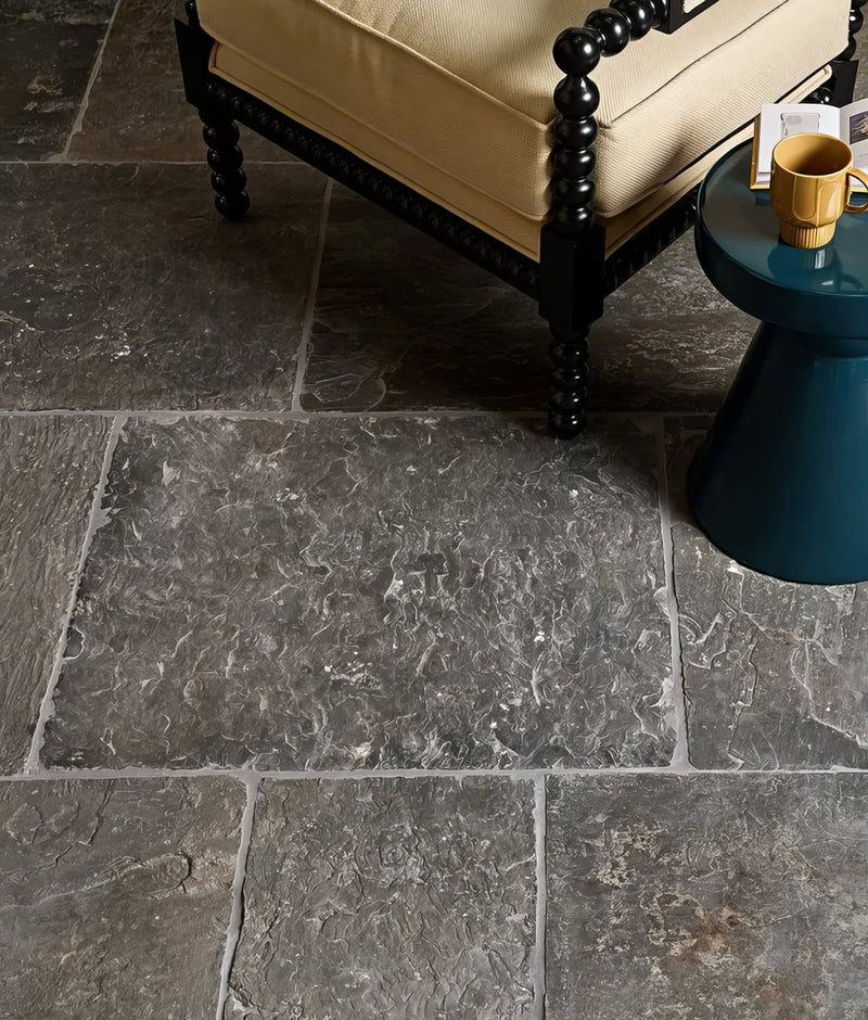 Dark gray sandstone tiles with a natural textured surface and subtle veining for flooring and wall use