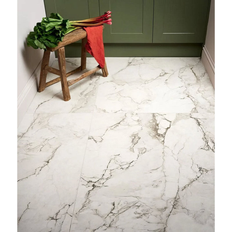 White marble-effect porcelain floor tiles with elegant gray veining from sculpture grande collection