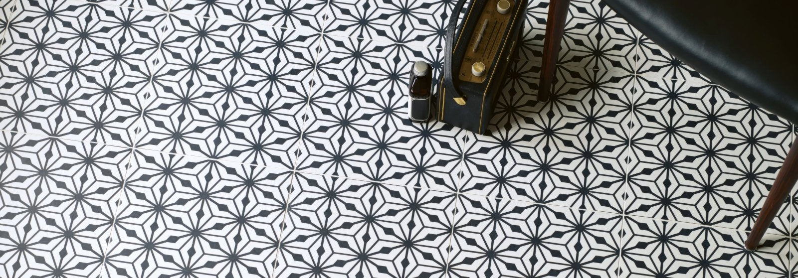 Black and white geometric patterned floor tile from the sorrento tiles collection for stylish home flooring