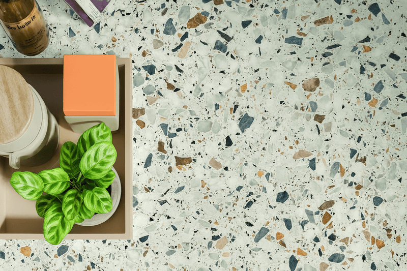 Terrazzo countertop with gray blue brown and beige speckled fragments in a light cement base from terrazzo effect floor tiles collection