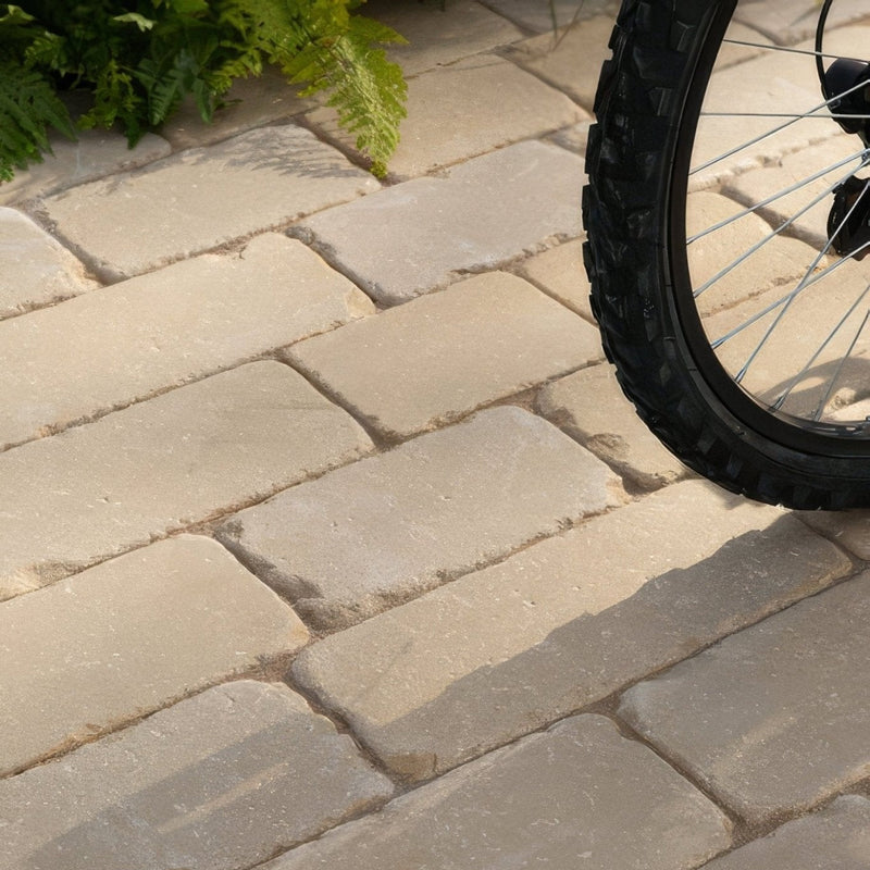 Beige rectangular stone pavers with natural slightly rough texture from trafalgar sandstone collection