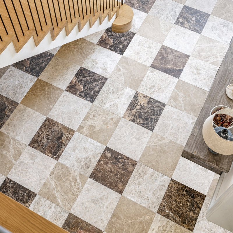 Checkerboard patterned marble floor tiles in alternating light beige and dark brown tones from versailles marble honed collection