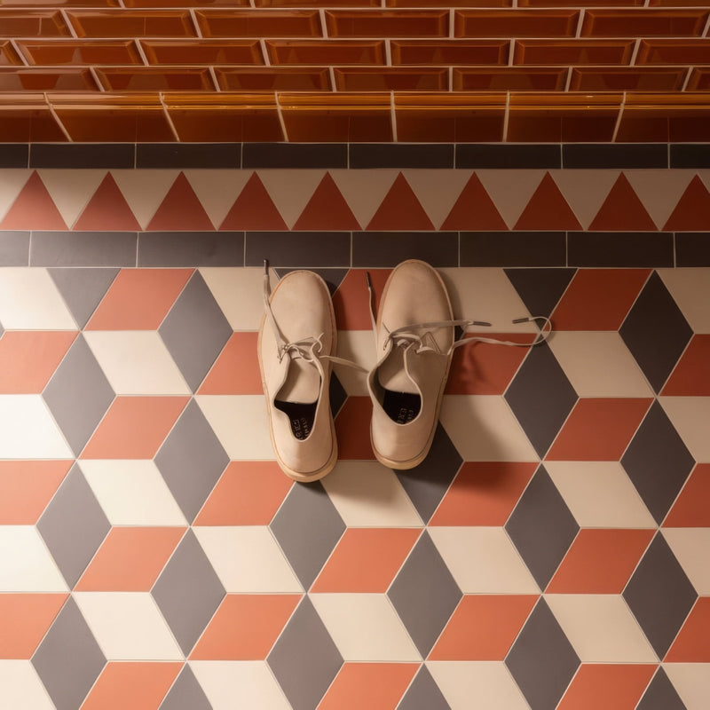 Beige suede lace-up shoes with a classic minimalist design in victorian floor tiles bloomsbury pattern background