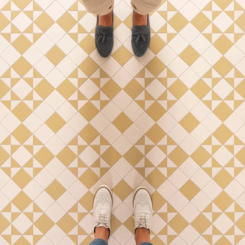 Gray suede loafers with tassel details featured in a victorian floor tiles braemar pattern collection