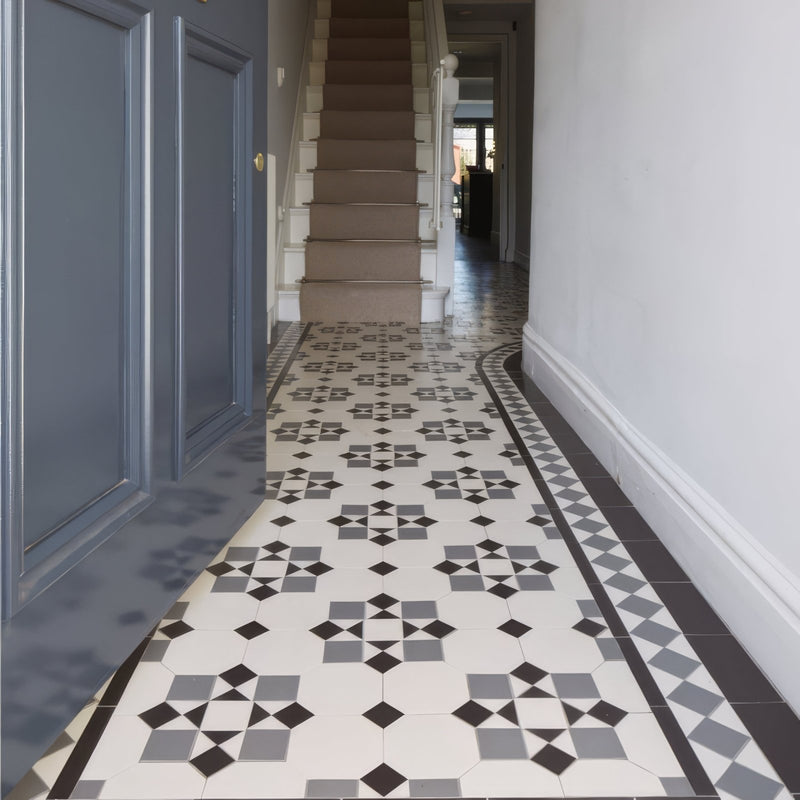 Black gray and white Victorian floor tiles with classic diamond geometric pattern perfect for vintage flooring designs