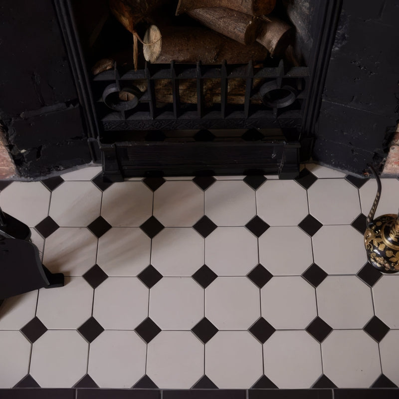 Black and white hexagonal Victorian floor tiles with diamond-shaped accents in York pattern for decorative flooring