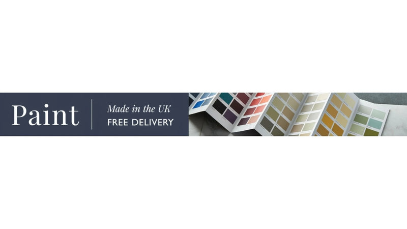 Colorful paint swatch books in a neat row from walls and ceilings paint collection for interior color selection