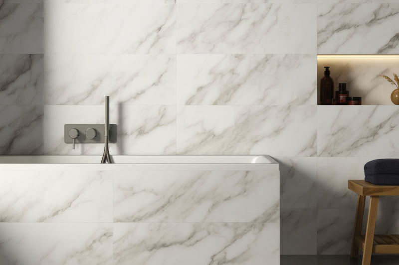 White marble-effect wall tiles with subtle gray veining ideal for modern bathroom walls in the white bathroom tiles collection