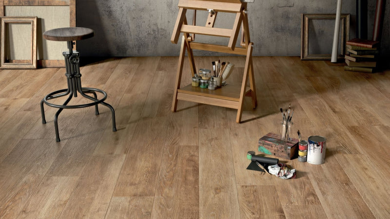 Wood effect kitchen tiles with a natural light brown wooden floor finish and visible grain patterns
