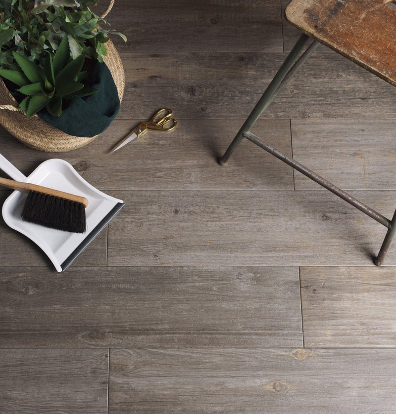 Gray wood-effect floor tiles with a natural rustic finish in a wood effect tiles collection