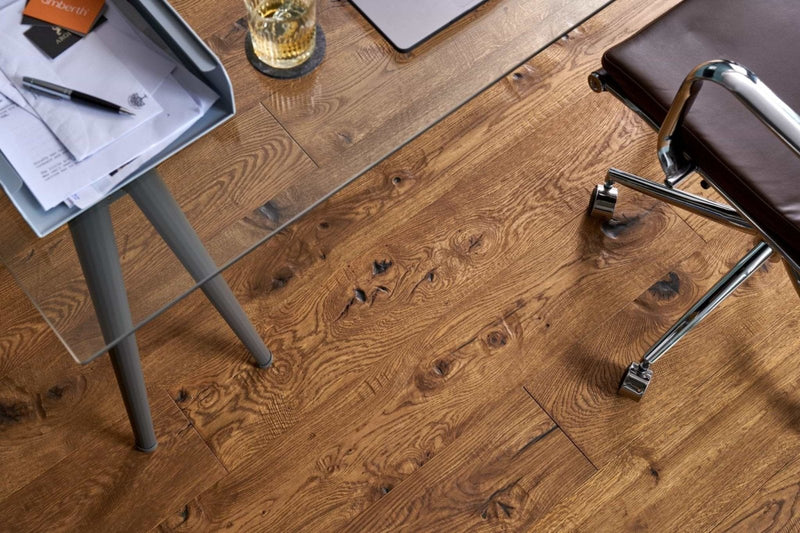 Warm-toned oak hardwood floor with visible grain and natural knots from woodpecker Berkeley flooring collection