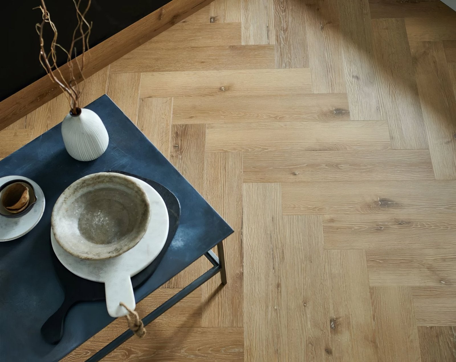 Light brown herringbone patterned wooden floor from woodpecker brecon flooring collection