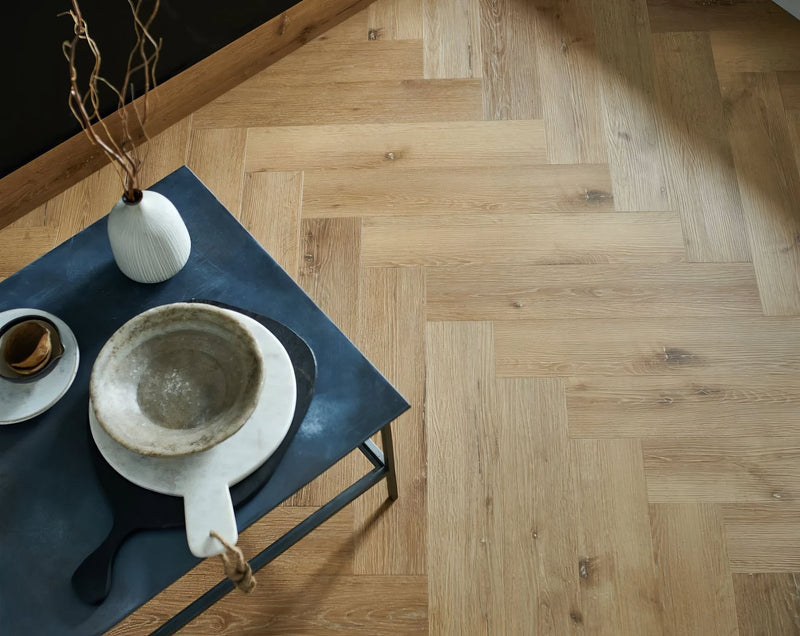 Light brown herringbone patterned wooden floor from woodpecker brecon flooring collection
