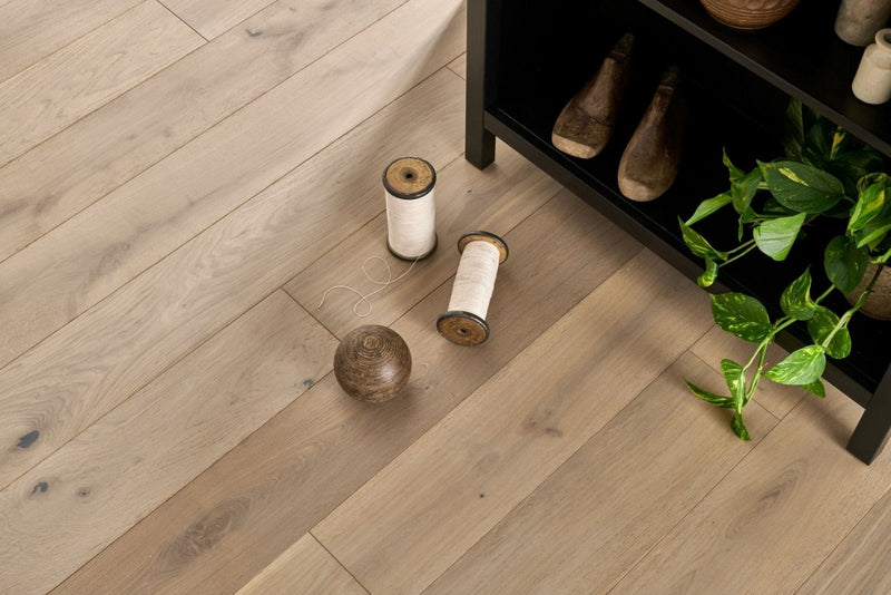 Light gray wood-plank flooring with a natural rustic finish from Woodpecker Harlech engineered oak flooring collection
