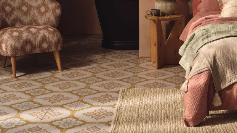 Patterned yellow floor tiles with geometric designs in beige cream and muted gold tones for stylish flooring