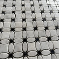 Black dot Carrara marble flower mosaic used as a cloakroom floor