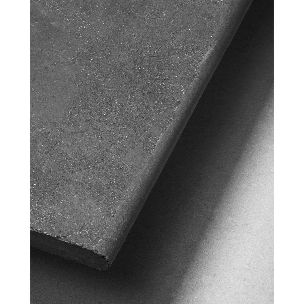 Galway Limestone seasoned bullnose coping edging a pool