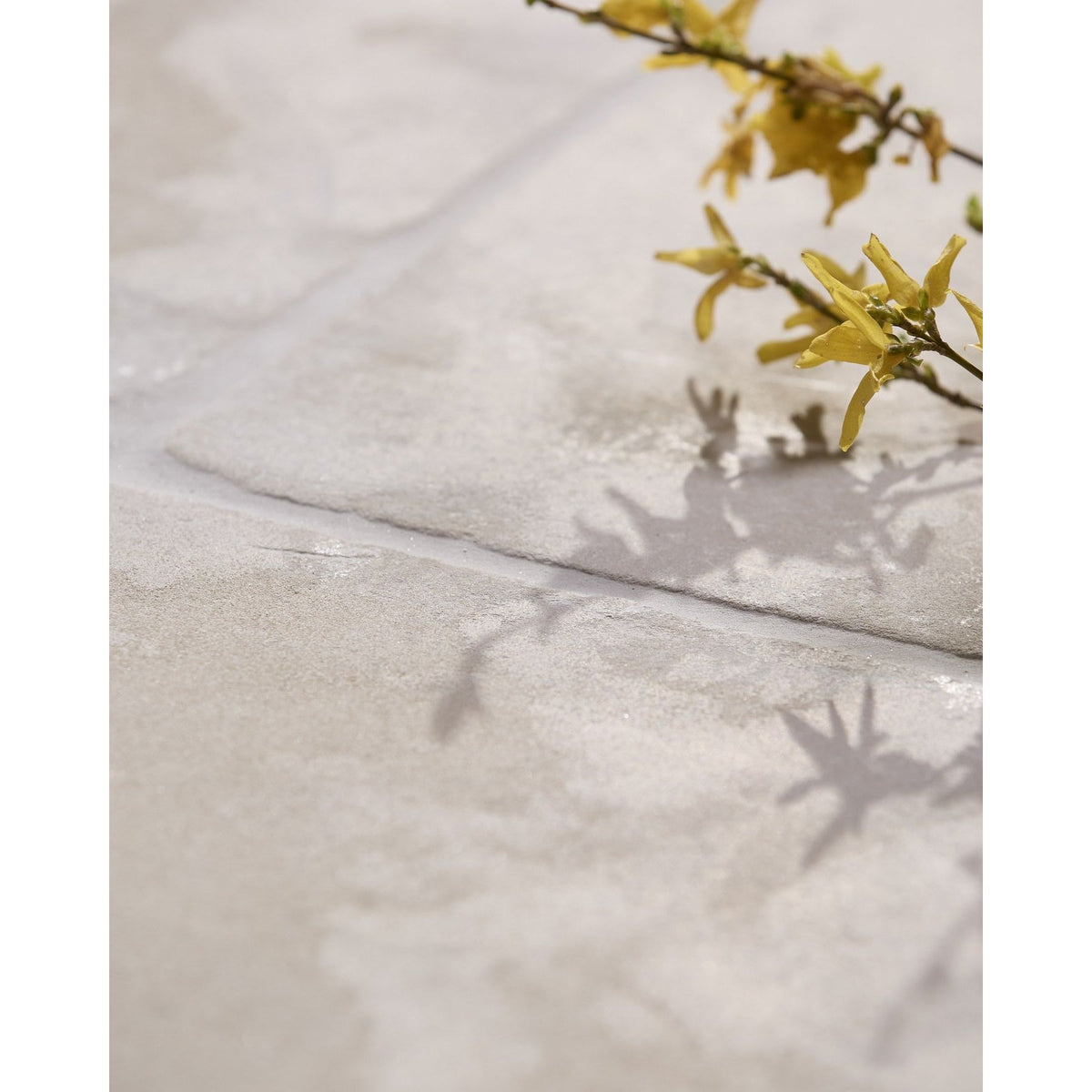 
Romaine Limestone Tumbled random-length flagstones laid