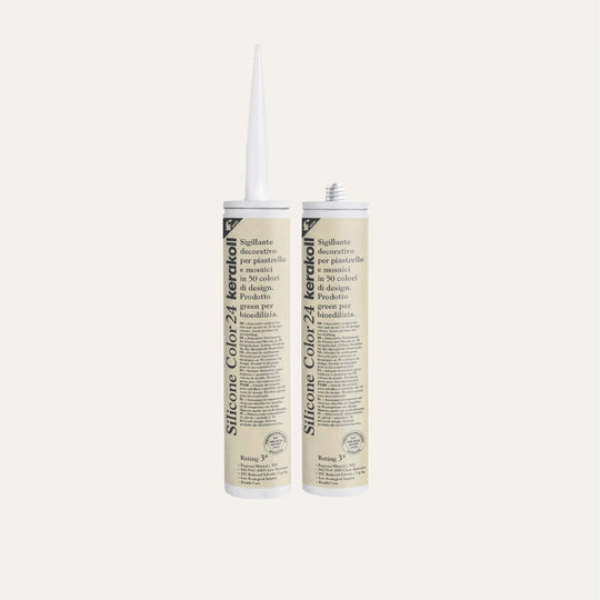 Ca'Pietra Kerakoll Silicone Colour in Parchment (No.24), a colour-matched 310ml silicone sealant cartridge shown as a cured colour sample