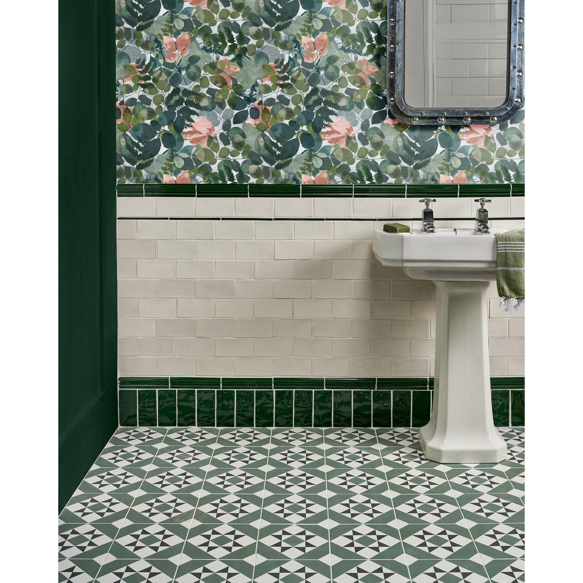 Ca'Pietra Architectural Ceramic Bead Moulding in glossy olive green, 20 x 2 x 2cm, on a tiled wall