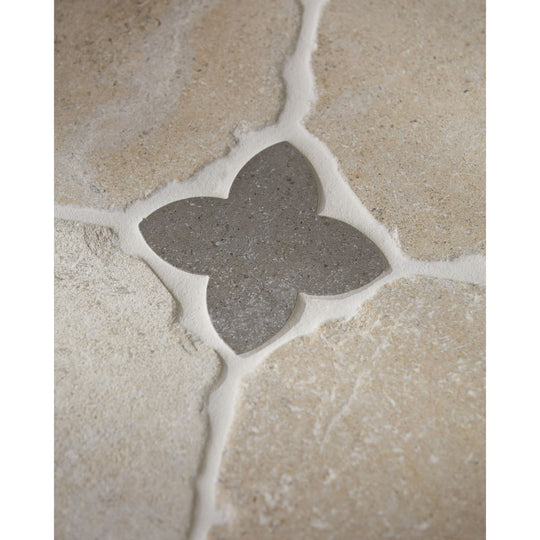 Clover Cabochon in Hazlebury Limestone set into a Lacock limestone floor