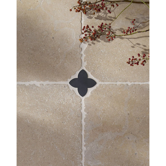 Clover Cabochon in Nero Slate set into a limestone octagon floor