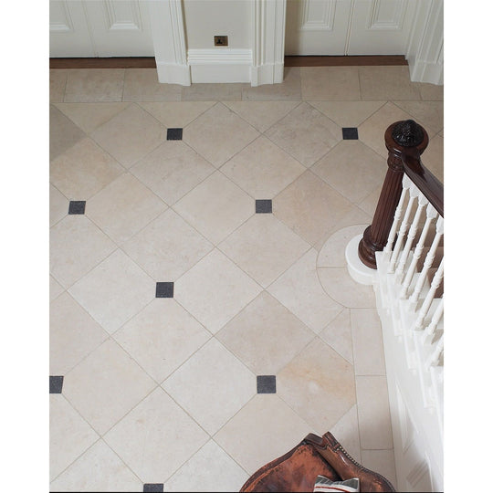 Limestone octagon hallway floor with Tora Blue Limestone cabochons