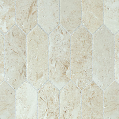 Close detail of brushed Shellstone limestone pickets showing shell traces and a low tactile texture