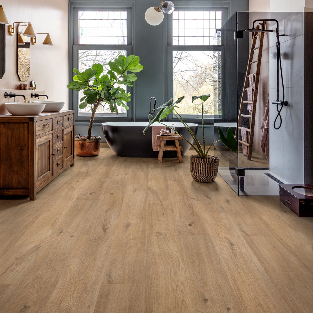 Warm-toned oak-look laminate flooring brigg blue on cotton with natural wood grain finish