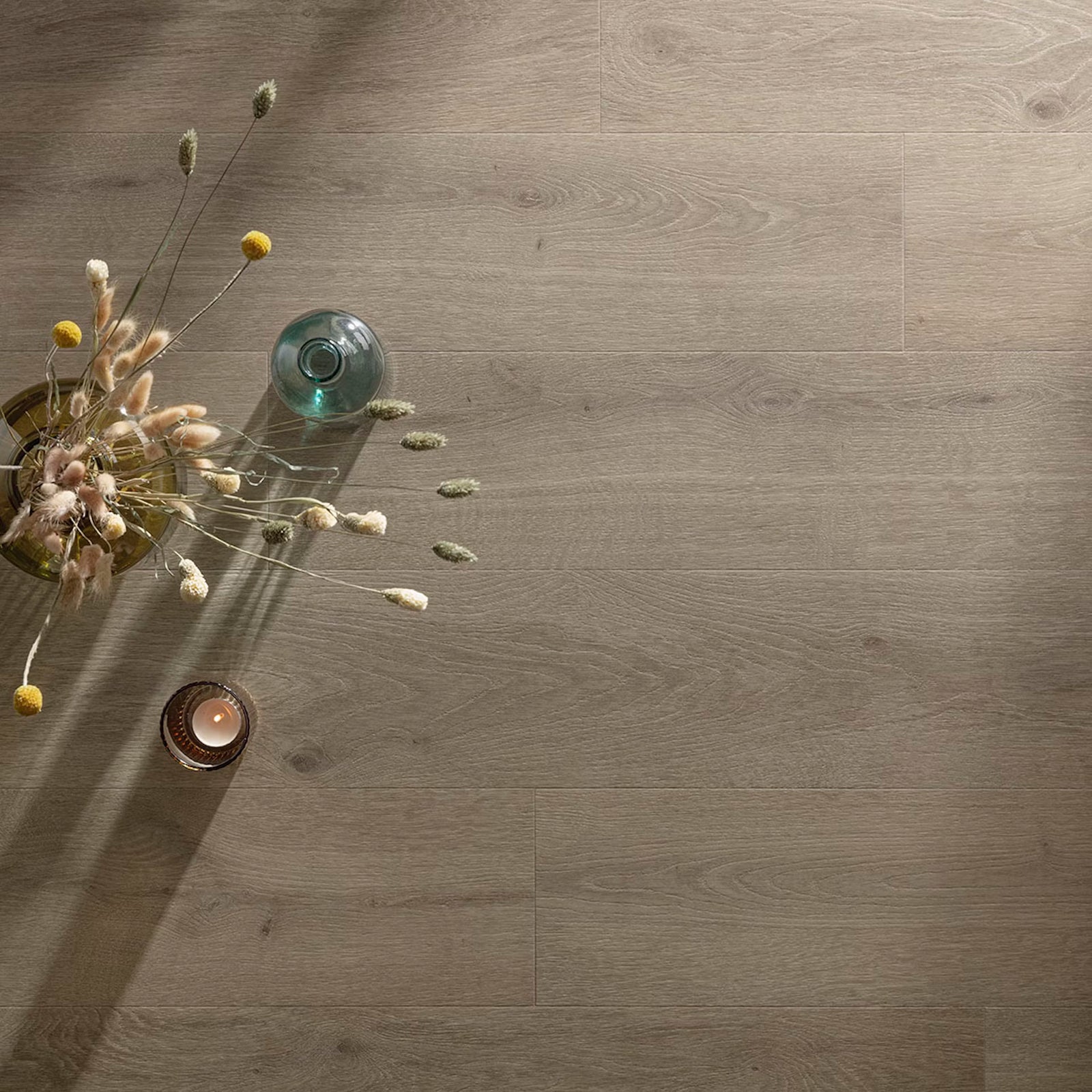 Stonehenge f053 vinyl planks featuring gray wood-effect laminate flooring with a natural grain pattern