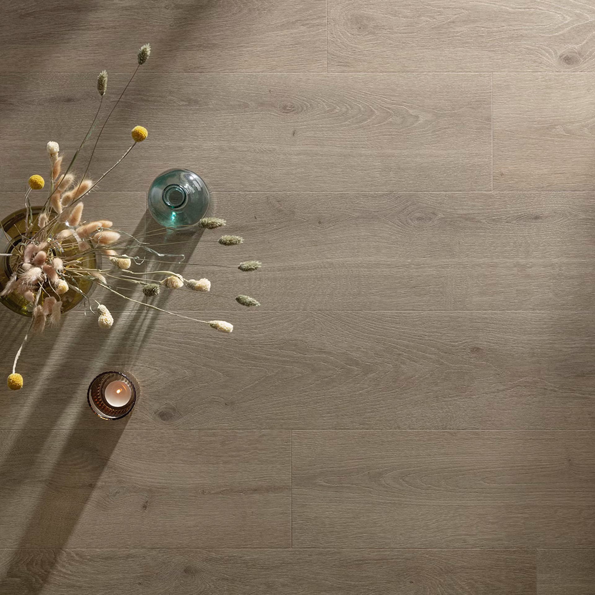 Stonehenge f053 vinyl planks featuring gray wood-effect laminate flooring with a natural grain pattern